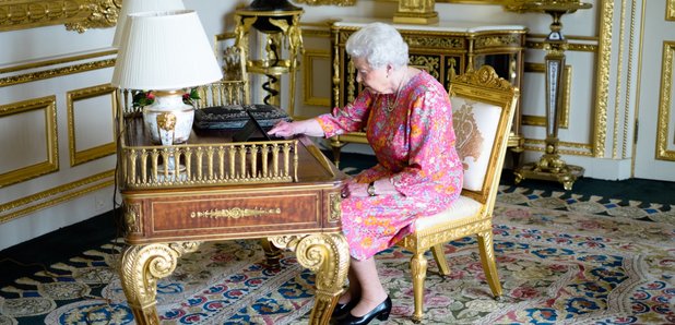 The Queen tweeting